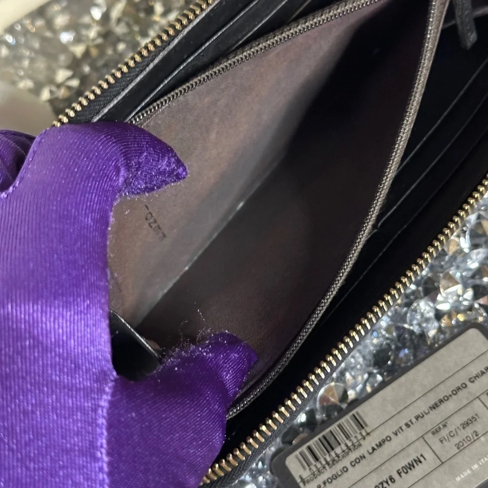 Vintage Fendi black patent leather zip-around continental wallet.